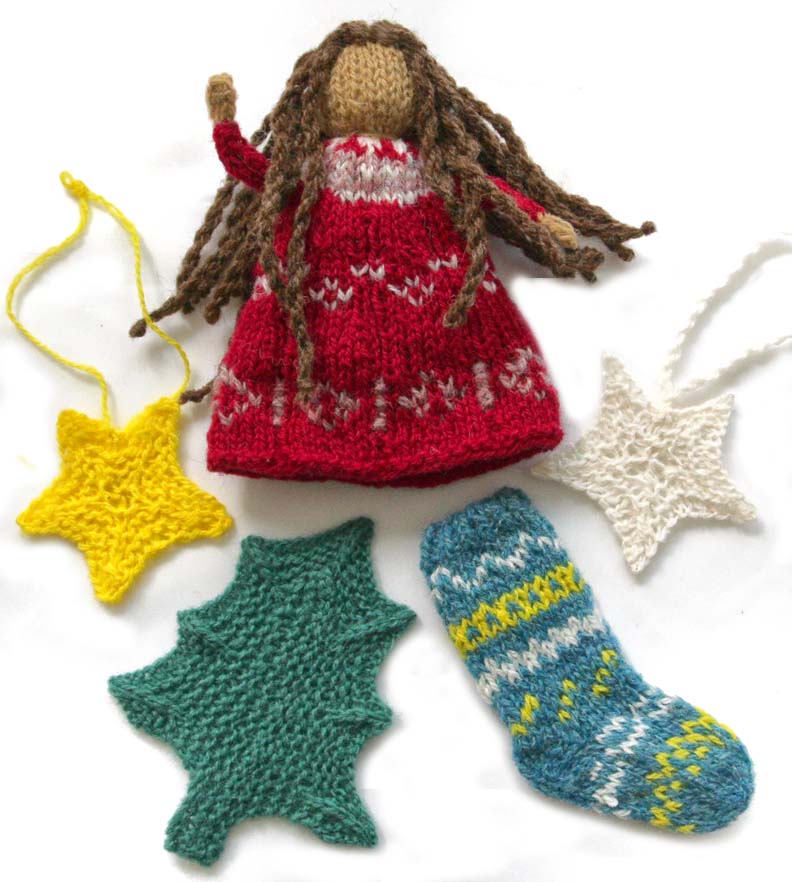 variety of ornaments knitted star, tree, doll, stocking