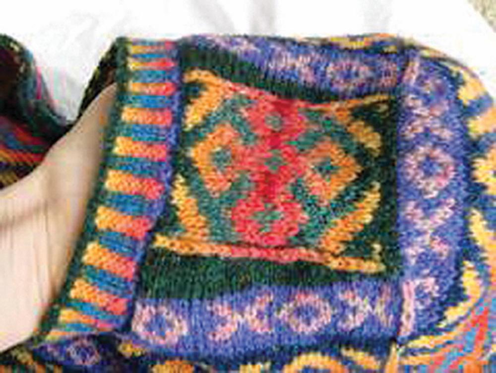 saddle on shoulder of knitted autumn fair isle sweater