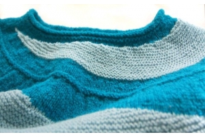 close up of splash and cloud shetland ebb and flow sweater yoke