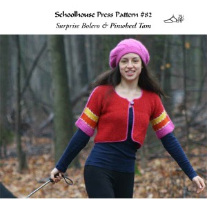 Cover of the Surprise Shrug and Pinwheel Tam; woman in pink spiral knitted tam and knitted red, pink, orange, and yellow shrug jacket