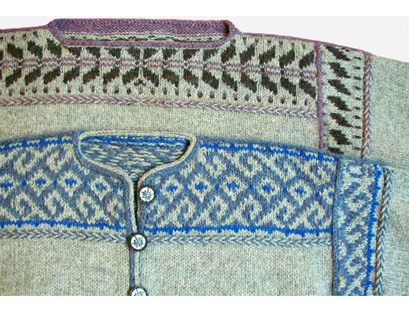 Close up of two sweater yokes with knitted braid pattern