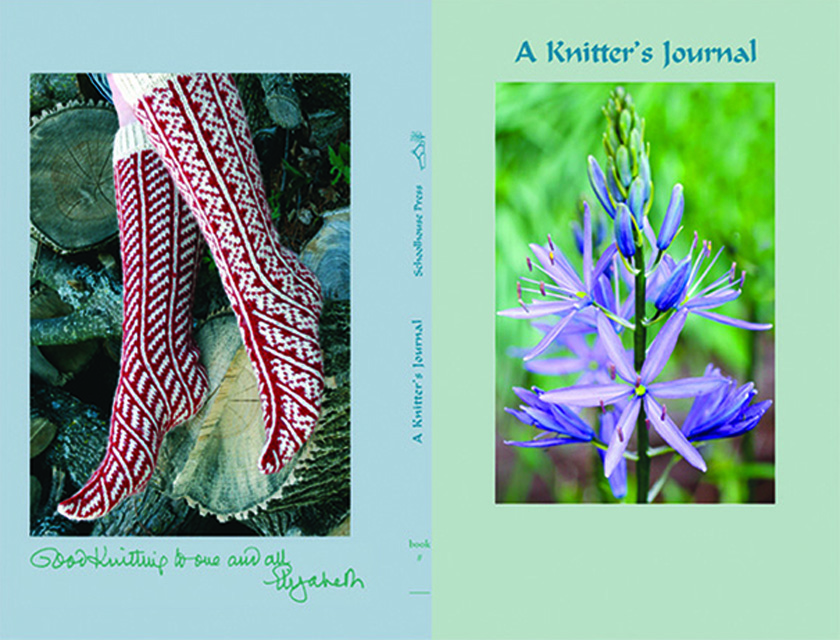 Close up of A Knitter's  Journal product, purple lily on front cover and dangling legs with art socks in red and white pattern