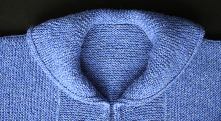 close up of blue EZ Coat collar folded down