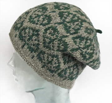 aspen leaf motif in grey and green, slouched on glass mannequin head